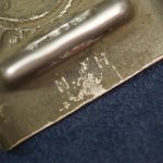 Tabbed Heer Buckle in Aluminum by Hueck