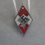 Later period zinc HJ member badge