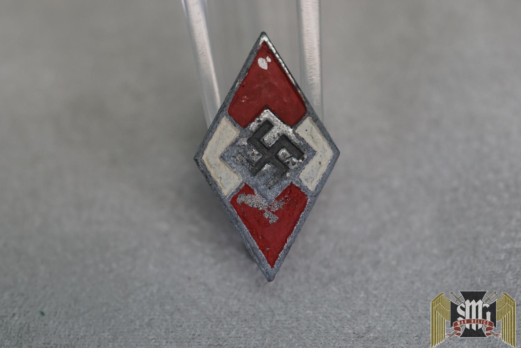 Later period zinc HJ member badge
