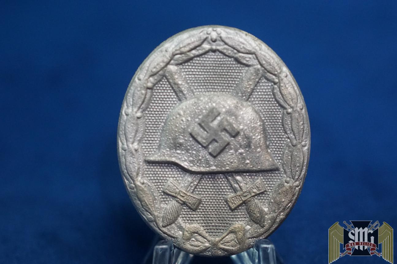 Silver wound badge by Carl Wild ‘107’