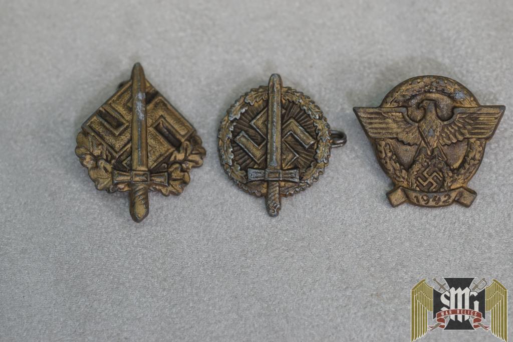 Police donation badge set in gold