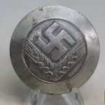 RAD WJ brooch