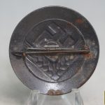 RAD WJ brooch