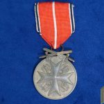 German Eagle Order Medal in Bronze with Swords by G.H. Osang Marked 80