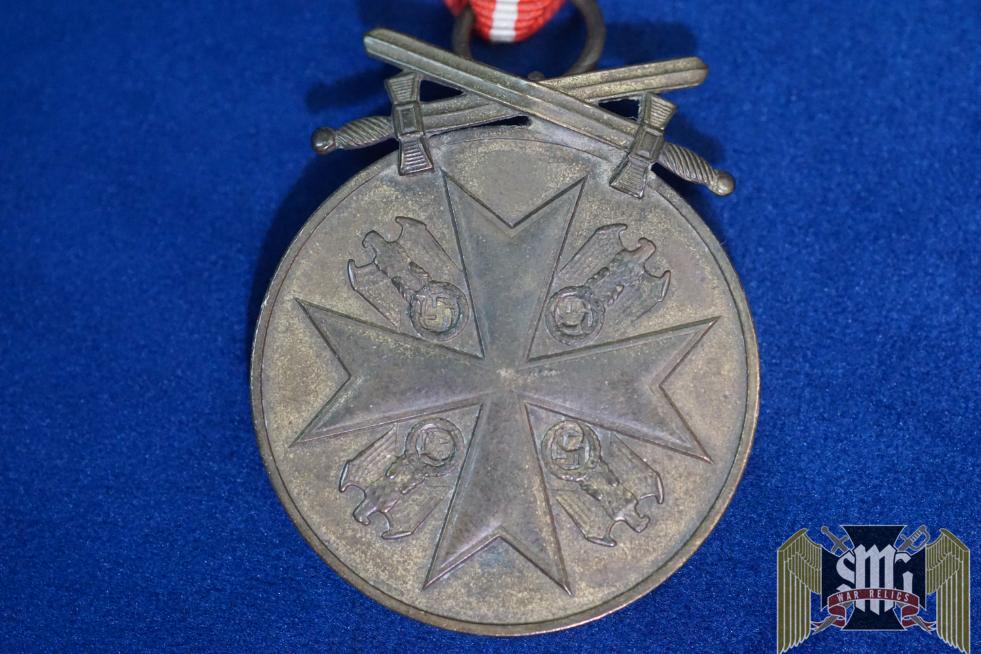 German Eagle Order Medal in Bronze with Swords by G.H. Osang Marked 80