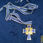 mothers cross in gold