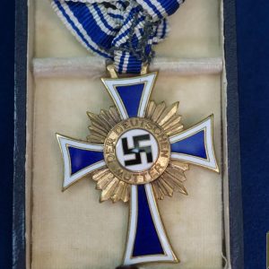 Cased mothers cross in gold by Friedrich Linden