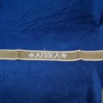 A beautiful camel felt cuff with light wear and typical white cordage tufts showing.