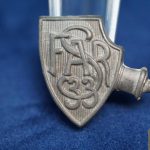 Austro Hungary Regimental cap badge/tinnie 33rd Heavy Field Artillery