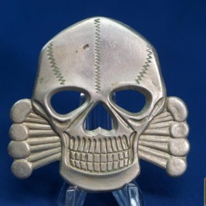 British Made Skull and Cross Bones cap badge