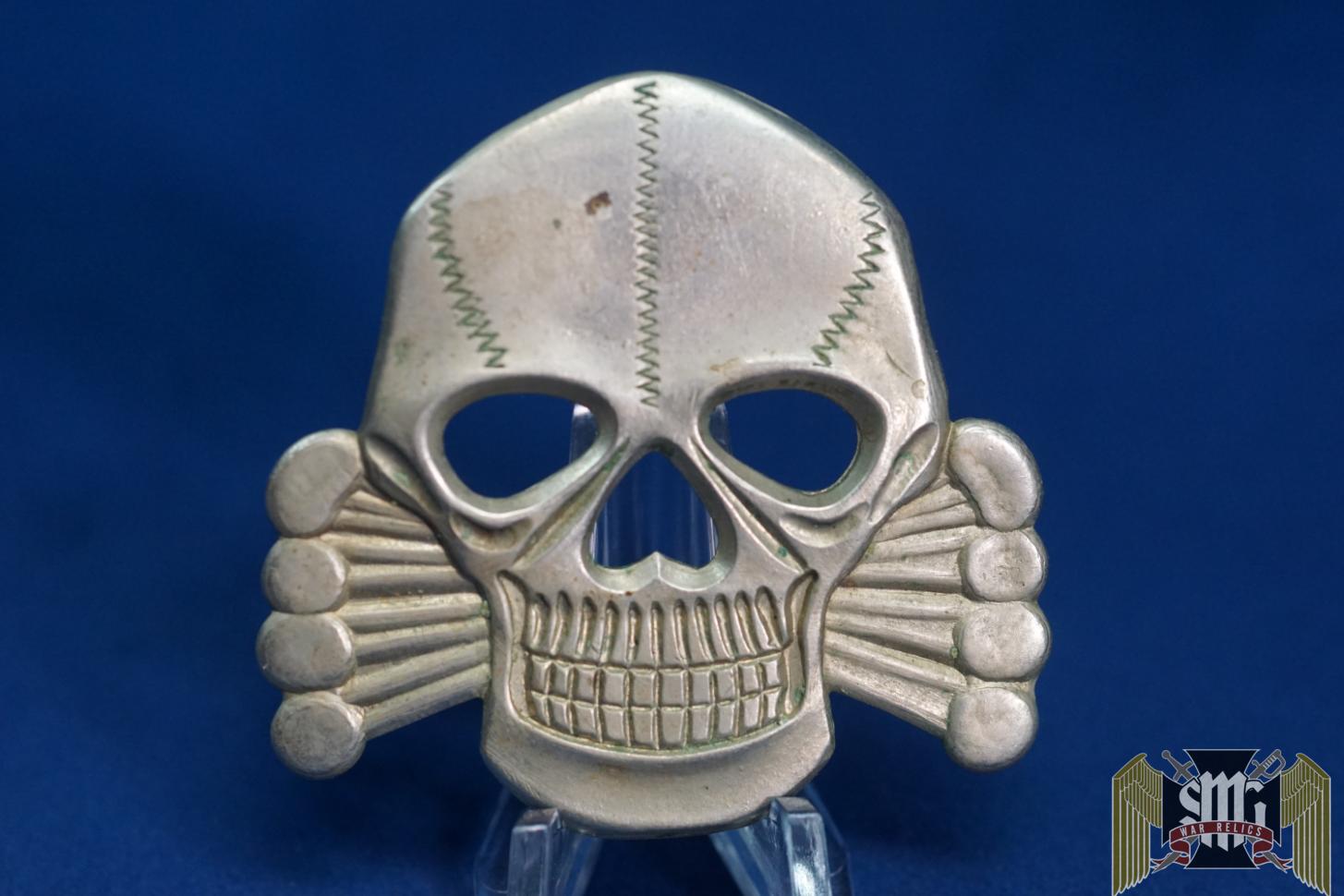 British Made Skull and Cross Bones cap badge