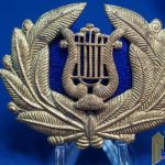 US M1897 Musician cap badge