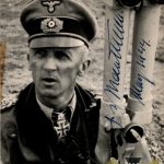 stock image of the general with trench binoculars, signed adding rank and dated May, 1944 (though signed post-war)