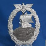 Auxiliary Cruiser badge by Foerster & Barth L/21 Marked. Missing catch