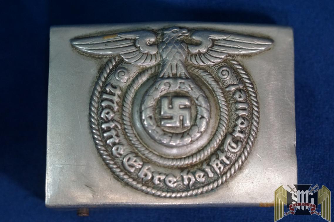 SS buckle in nickel by Overhoff