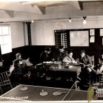 Photo of Photo Recon Pilots relaxing in the Mission planning room Roger Aubry Estate
