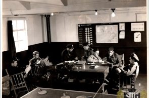Photo of Photo Recon Pilots relaxing in the Mission planning room Roger Aubry Estate