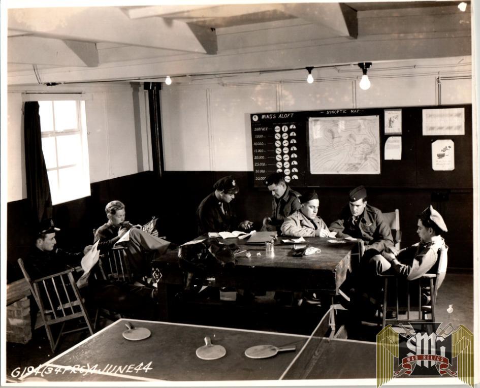 Photo of Photo Recon Pilots relaxing in the Mission planning room Roger Aubry Estate