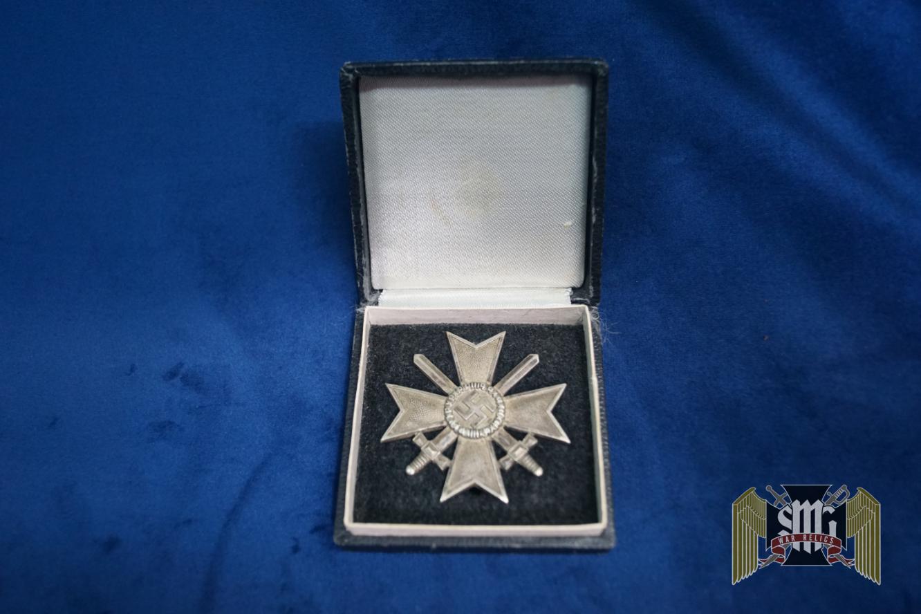 Cased First Class War Merit Cross w/repair with Swords by Deschler Marked “1” in Tombak