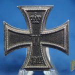 A super attractive cross! Gorgeous rough textured core that is nearly perfect. Shows just a hint of oxidation around the inside rim. Flat block hinge and S-W marked on the pin. 